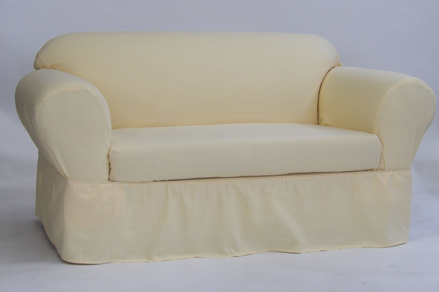 Washed Cotton Duck Ruffled Two-Piece Loveseat Slipcover