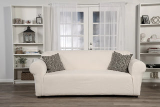 A picture of the Snowball One-Piece Stretch Slipcover in the Color Off White by The Slip Cover Company.